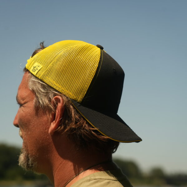 black cat black and yellow trucker cap