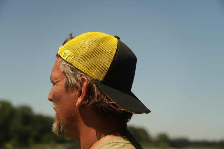 black cat black and yellow trucker cap