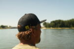 black cat black flat peak cap